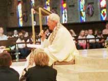 Msgr. Phil with the First Communion celebrants